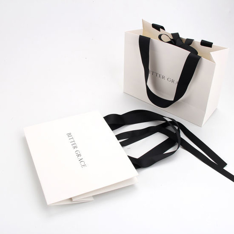 Eco-Friendly-White-Paper-Shopping-Bag-with-Black-Grosgrain-Ribbon_800x800
